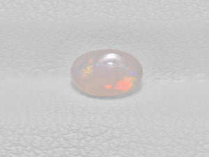 8801442-cabochon-very-light-greyish-yellow-with-multi-color-flashes-igi-australia-natural-white-opal-0.26-ct