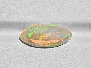 8801555-cabochon-light-yellow-with-green-&-orange-flashes-igi-ethiopia-natural-white-opal-4.31-ct