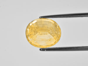 8802072-oval-lustrous-intense-yellow-grs-sri-lanka-natural-yellow-sapphire-12.12-ct