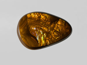 8802431-cabochon-brown-with-multi-color-swirls-&-bubbles-igi-mexico-natural-fire-agate-13.47-ct